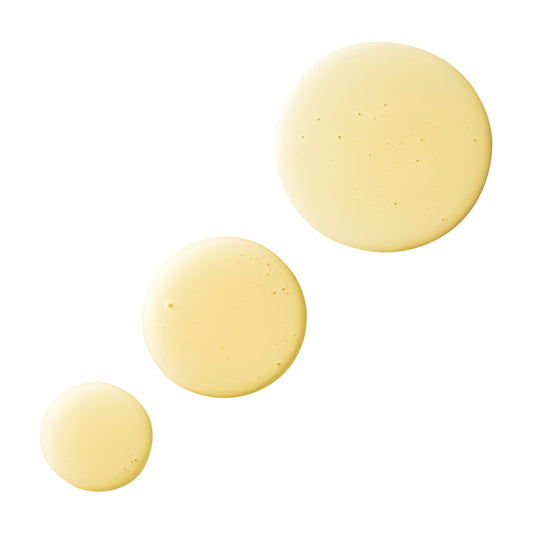 Three globs of Farmacy's Clean Bee honey + hyaluronic acid cleanser